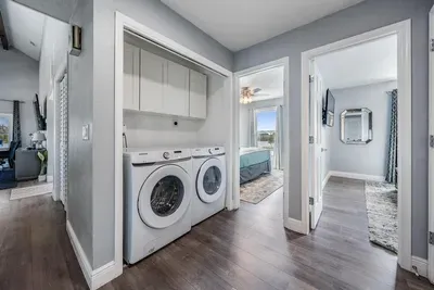 Convenient in-home laundry with modern washer & dryer, ample storage, and easy access near bedrooms. Perfect for extended stays or family trips, this space adds comfort and practicality to your getaway.