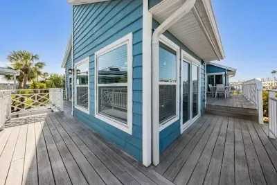 Wraparound balcony with sweeping water views and plenty of space to relax. Perfect for sunrise coffee, evening cocktails, or simply soaking in the coastal breeze while enjoying the beauty of your private retreat.