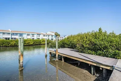 Private dock with direct water access—perfect for fishing, kayaking, or launching a boat. Enjoy peaceful mornings by the water or sunset views in the evening, making this the ultimate coastal retreat.