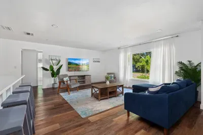 Enjoy a spacious layout perfect for relaxing or entertaining, with seamless flow to the kitchen and dining area—comfortable, modern, and welcoming for every guest.
