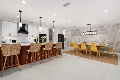 Enjoy the perfect open-concept gathering space with a chef-inspired kitchen, oversized island seating, and a stylish dining area. Bright, modern, and spacious—ideal for family meals, entertaining, and making vacation memories together.