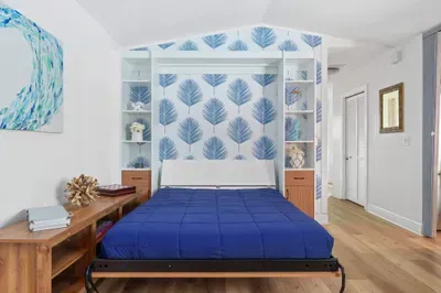 Maximize your space with our elegant queen-size Murphy bed! This smart design seamlessly blends functionality with style, providing a comfortable sleeping area that easily folds away when not in use.