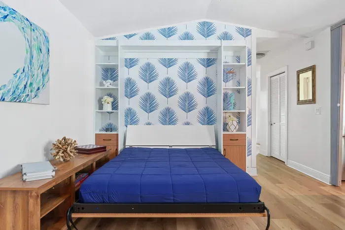 Maximize your space with our elegant queen-size Murphy bed! This smart design seamlessly blends functionality with style, providing a comfortable sleeping area that easily folds away when not in use.