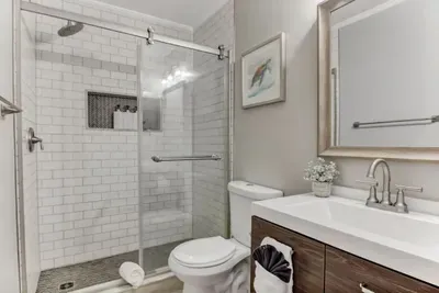 Modern Bathroom outfitted with All Necessities!