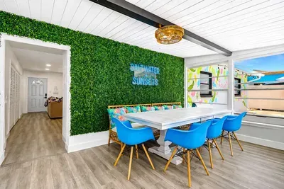 Family dining table with a view straight to the pool - every meal feels like vacation, and the kids already know where they're headed after dessert.