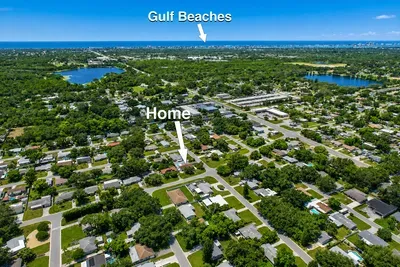Nine minutes from the Gulf beaches, tucked into a quiet Largo neighborhood — the beach for the day, a real neighborhood for the night.