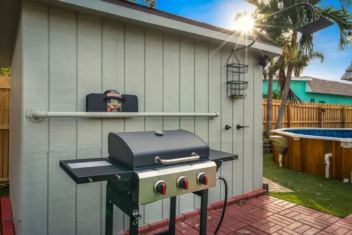 Fire up the grill in this private backyard cookout zone, just steps from the hot tub. Perfect for sunny lunches or evening BBQs, this space makes outdoor dining easy, fun, and a highlight of your stay.