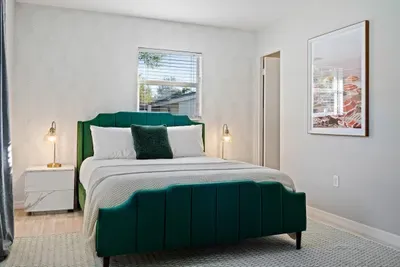 Bedroom with Queen bed and ensuite bathroom.