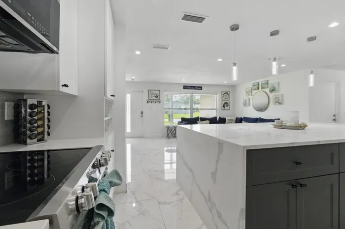 This clean and functional kitchen comes fully equipped for your cooking needs, including a selection of complimentary condiments and basic essentials to get you started.