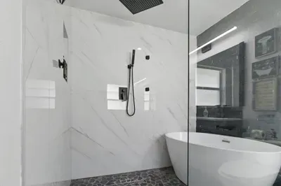 Featuring a luxurious wide oval bathtub, perfect for a relaxing soak. Additionally, enjoy the convenience of a separate shower, offering a refreshing option for your daily routine.