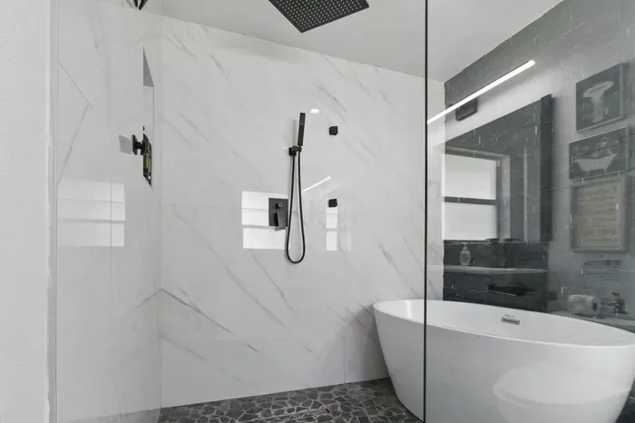 Featuring a luxurious wide oval bathtub, perfect for a relaxing soak. Additionally, enjoy the convenience of a separate shower, offering a refreshing option for your daily routine.