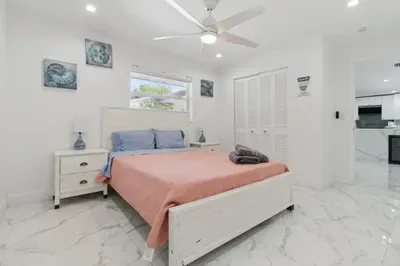 Drift off to sleep in a cozy double-sized bed, complete with soft linens and plush pillows for your comfort. Whether you're settling in after a day of adventure or enjoying a lazy morning, this peaceful sleeping space is designed to help you relax.