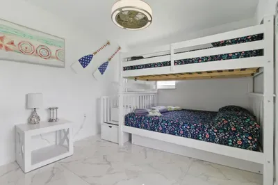 This versatile double deck bed features a double-sized bottom bunk, providing ample space and comfort for a restful night’s sleep. Whether you're sharing with family or friends.