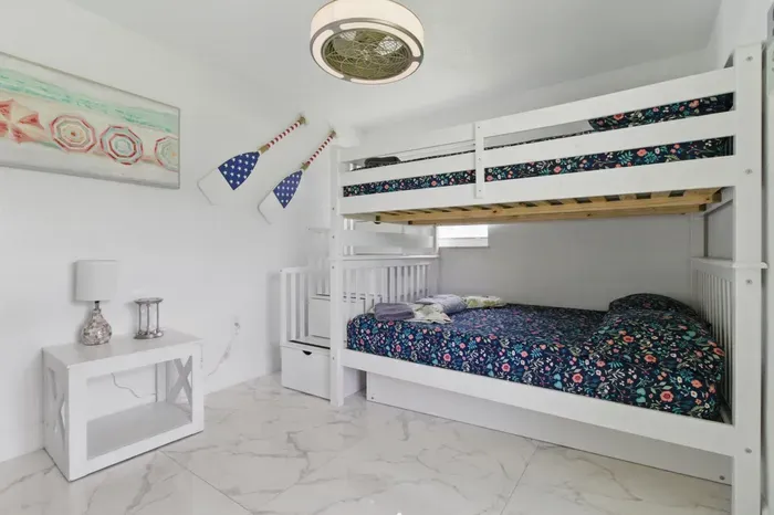 This versatile double deck bed features a double-sized bottom bunk, providing ample space and comfort for a restful night’s sleep. Whether you're sharing with family or friends.