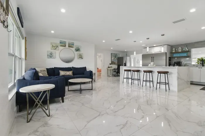 Enjoy the comfort of an open-concept living space that flows seamlessly into the kitchen—perfect for spending time together while cooking, dining, or relaxing.