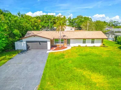 The attached garage adds convenience for parking, offering easy access to the home and added security for your vehicle during your stay.