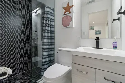 This well-maintained space includes a single bathroom and a separate comfort room, both designed for ease and convenience during your stay.