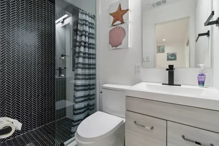 This well-maintained space includes a single bathroom and a separate comfort room, both designed for ease and convenience during your stay.