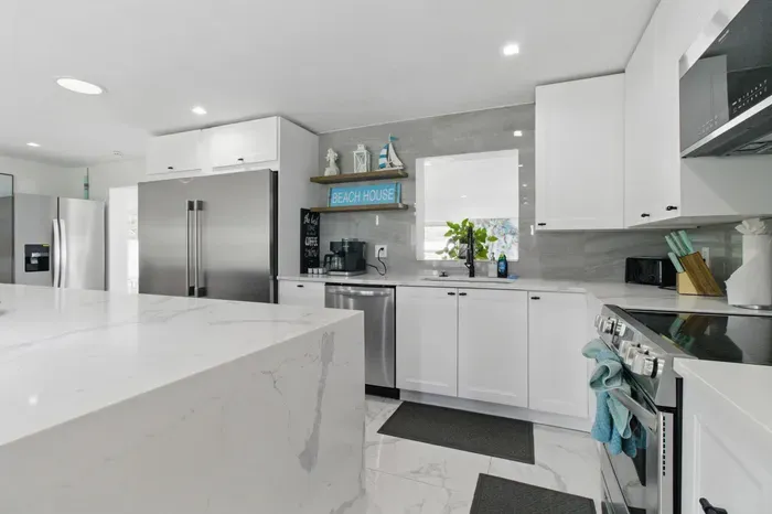 The open layout and clean design make it easy to cook, dine, and feel right at home.