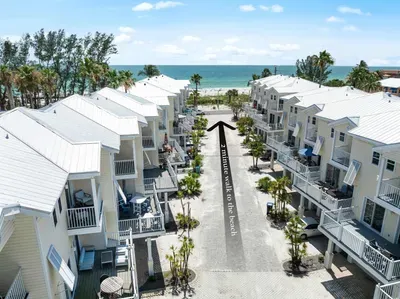 Gorgeous coastal community just steps from the beach! Enjoy ocean breezes, palm-lined paths, and bright seaside villas—perfect for relaxing, exploring, and soaking in endless Gulf views under the sun.