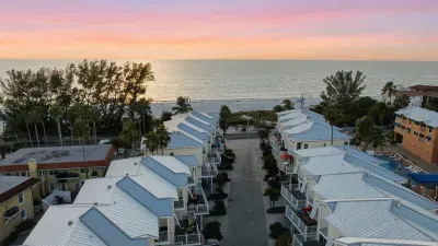 Breathtaking sunset over the Gulf shines above this peaceful beachfront community. Just steps from the sand, enjoy ocean breezes, pastel skies, and the ultimate coastal escape.