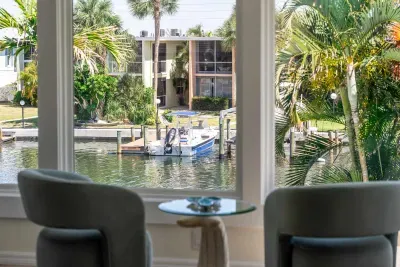 Wake up to peaceful waterfront views 🌴🌊 Relax with your morning coffee while overlooking the canal and tropical scenery. A perfect cozy spot to unwind, recharge, and enjoy the laid-back Florida lifestyle!
