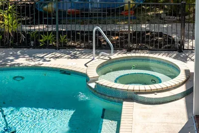 Relax and unwind in the private pool and spa 🌴☀️ Enjoy sunny afternoons, peaceful evenings, and the perfect tropical setting for making unforgettable vacation memories with family and friends!