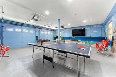 Enjoy ping pong, arcade games, and plenty of room for family and friends to relax, play, and make unforgettable vacation memories after a day at the beach!