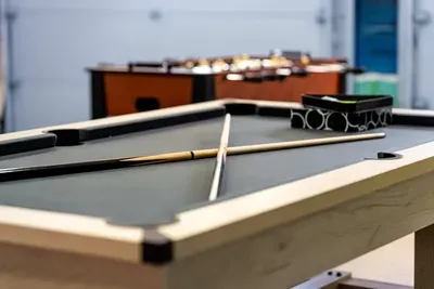 Challenge friends and family to a fun game of pool 🎱✨ This entertaining game room is the perfect spot to relax, unwind, and make unforgettable vacation memories after a day at the beach or on the water!