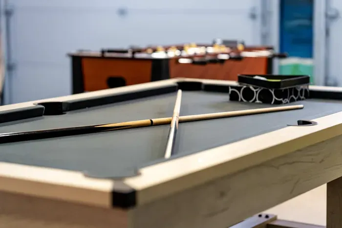 Challenge friends and family to a fun game of pool 🎱✨ This entertaining game room is the perfect spot to relax, unwind, and make unforgettable vacation memories after a day at the beach or on the water!