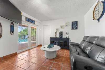 Cozy indoor lounge space.  Relax on the comfortable seating, enjoy the laid-back beach vibes, and unwind after a fun day by the pool, at the beach, or exploring beautiful Anna Maria Island!