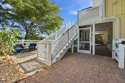 Spacious outdoor patio and private entrance. Enjoy relaxing tropical surroundings, easy access to the pool area, and plenty of space to unwind after a fun day exploring beautiful Anna Maria Island!