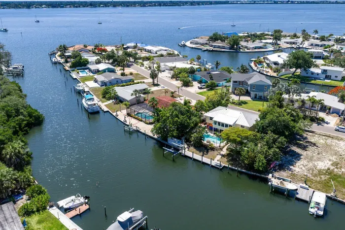 Waterfront island living at its best. Enjoy direct canal access, stunning water views, and a peaceful tropical setting just minutes from the beach — the perfect escape for boating, relaxing, and unforgettable Florida memories!