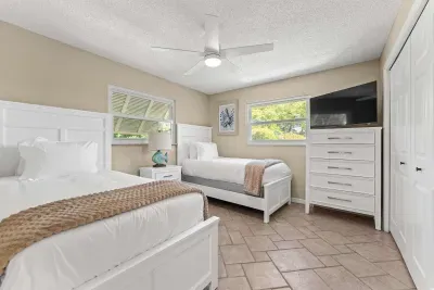 Featuring comfortable beds, a relaxing coastal vibe, and a TV for winding down after a fun day at the beach.