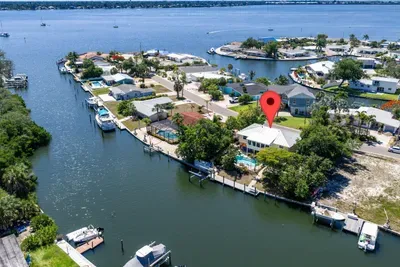 Enjoy peaceful island vibes, stunning water views, and easy boating access right from the backyard. The perfect spot to relax, unwind, and soak up the Florida sunshine!