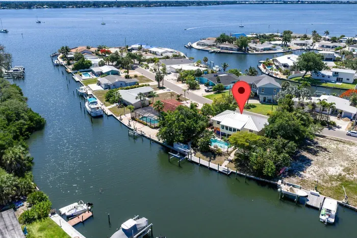 Enjoy peaceful island vibes, stunning water views, and easy boating access right from the backyard. The perfect spot to relax, unwind, and soak up the Florida sunshine!