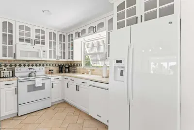 Fully equipped coastal kitchen. Enjoy a bright and spacious space perfect for preparing family meals, morning coffee, or late-night snacks after a fun day exploring the beautiful Florida coast!