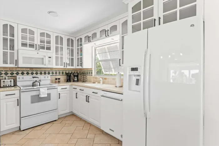 Fully equipped coastal kitchen. Enjoy a bright and spacious space perfect for preparing family meals, morning coffee, or late-night snacks after a fun day exploring the beautiful Florida coast!