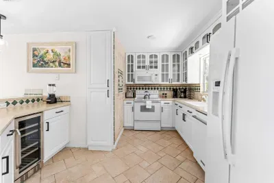 Bright and spacious chef’s kitchen. Fully equipped with everything you need for family meals, snacks, and vacation gatherings — plus a built-in wine cooler for relaxing evenings after a fun day by the water!