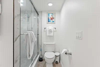 Enjoy a clean, relaxing space with a glass walk-in shower and everything you need to refresh after a fun beach day or waterfront adventure on beautiful Anna Maria Island!