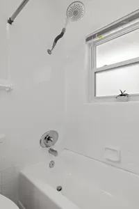 Bathroom with shower and tub.