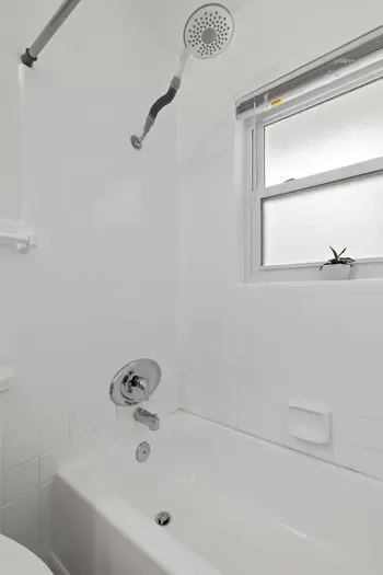 Bathroom with shower and tub.