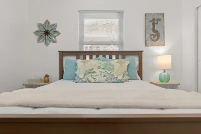 Private bedroom with cozy bed.