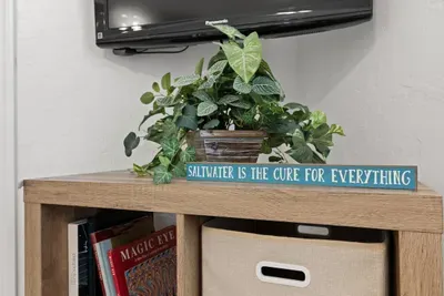 Fun decor, books, and TV nook.