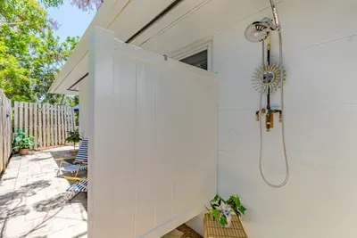 Outdoor shower for rinsing off all the beach sand after a fun day in the sun.