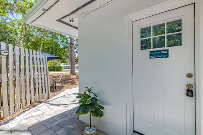 Front entrance with lock box.