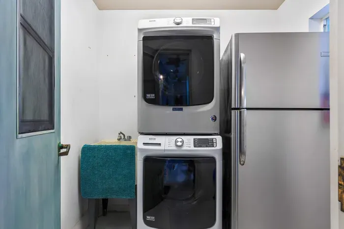 Enjoy the comfort of home with a modern washer and dryer set, perfect for extended stays or sandy beach days. Plus, an extra full-size fridge gives you all the space you need for groceries, drinks, and leftovers—ideal for families or group travelers.