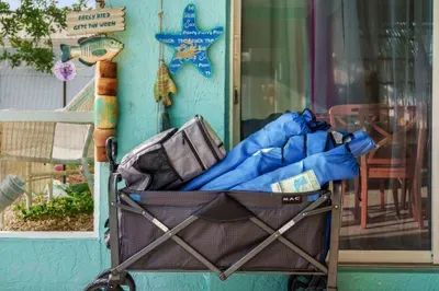 No need to pack the extras—we’ve got you covered! This stay includes a fully stocked beach gear wagon complete with chairs, umbrellas, and a cooler, making your trips to the shore totally hassle-free.
