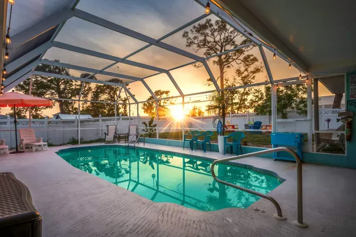 Unwind in your own private screen-enclosed pool oasis, where the sunsets paint the sky and twinkle lights set the mood.