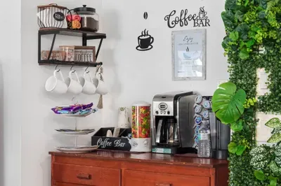 Start your mornings right at our cheerful in-house coffee bar! Featuring a variety of brewing options, including a single-serve Keurig and traditional coffee maker, this cozy corner is fully stocked with mugs, creamers, teas, and snacks.
